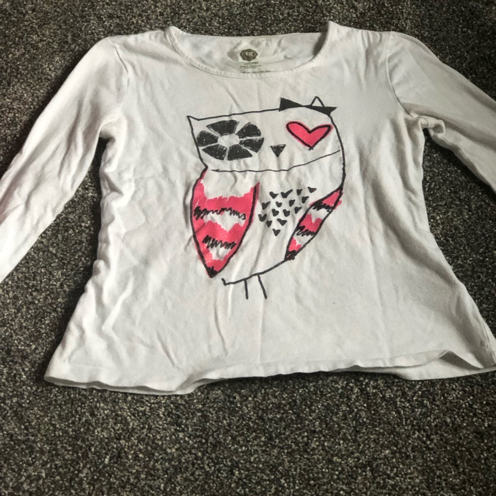 4 White t-shirts with graphic designs